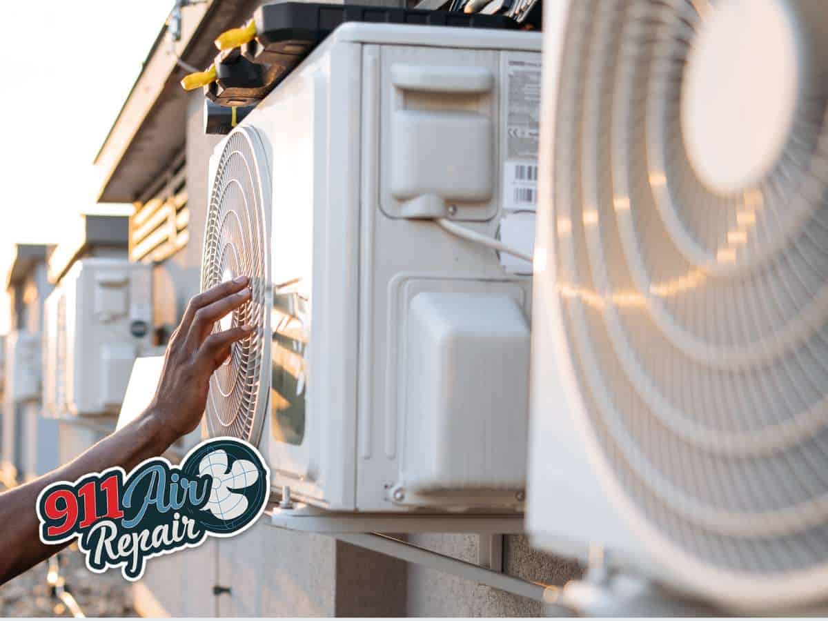 Technician performing AC repair on an outdoor air conditioning uni